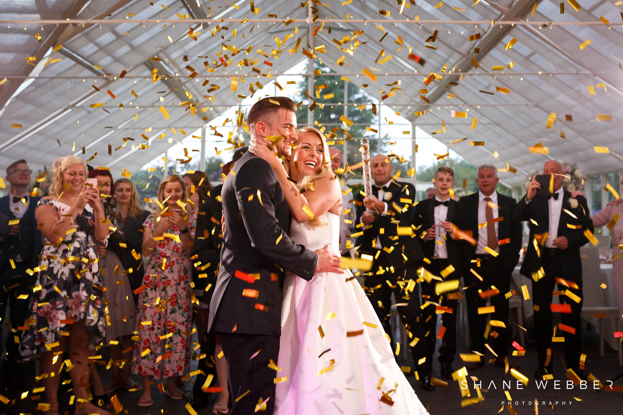 gold confetti cannon during first dance