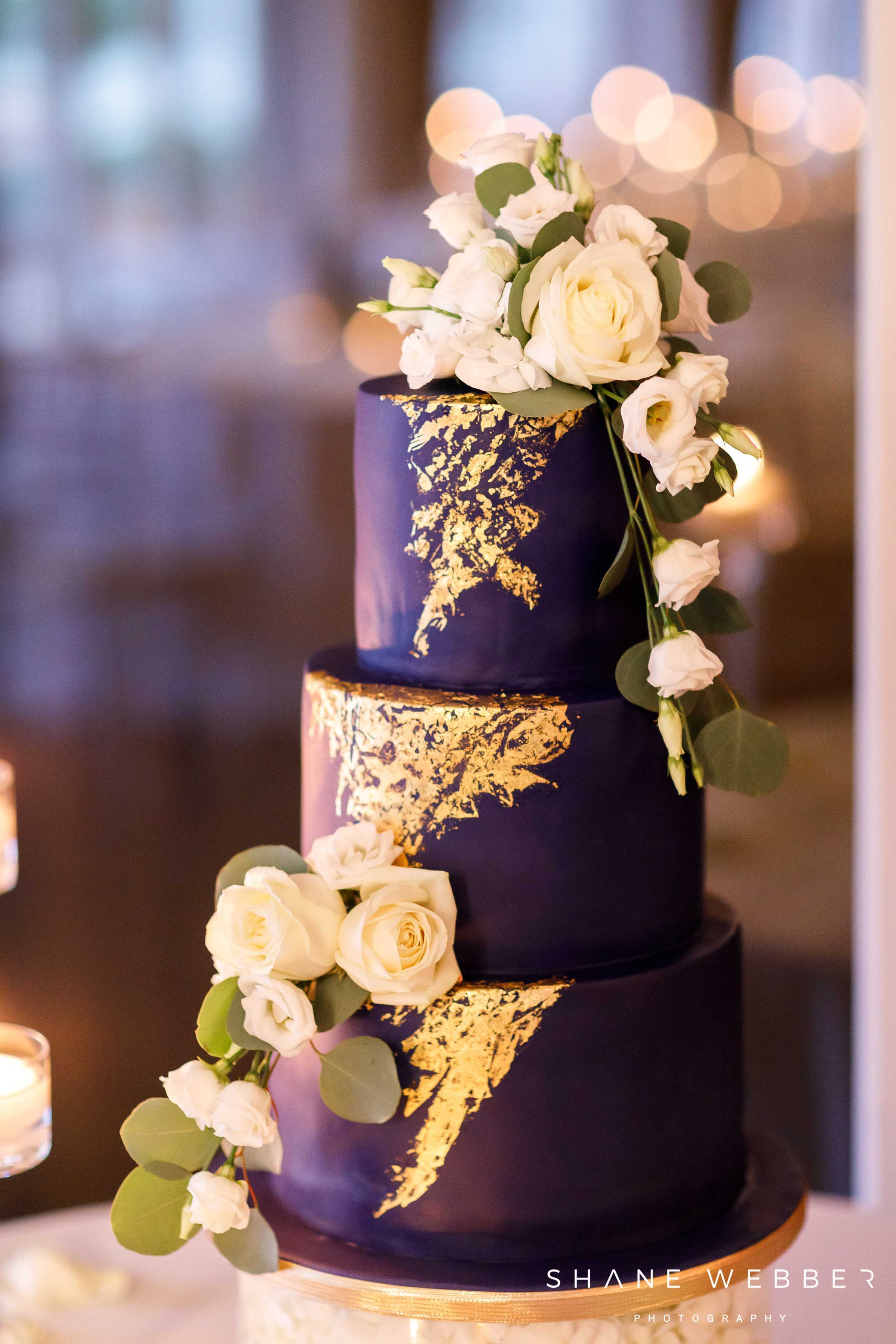 Navy blue and gold wedding cake