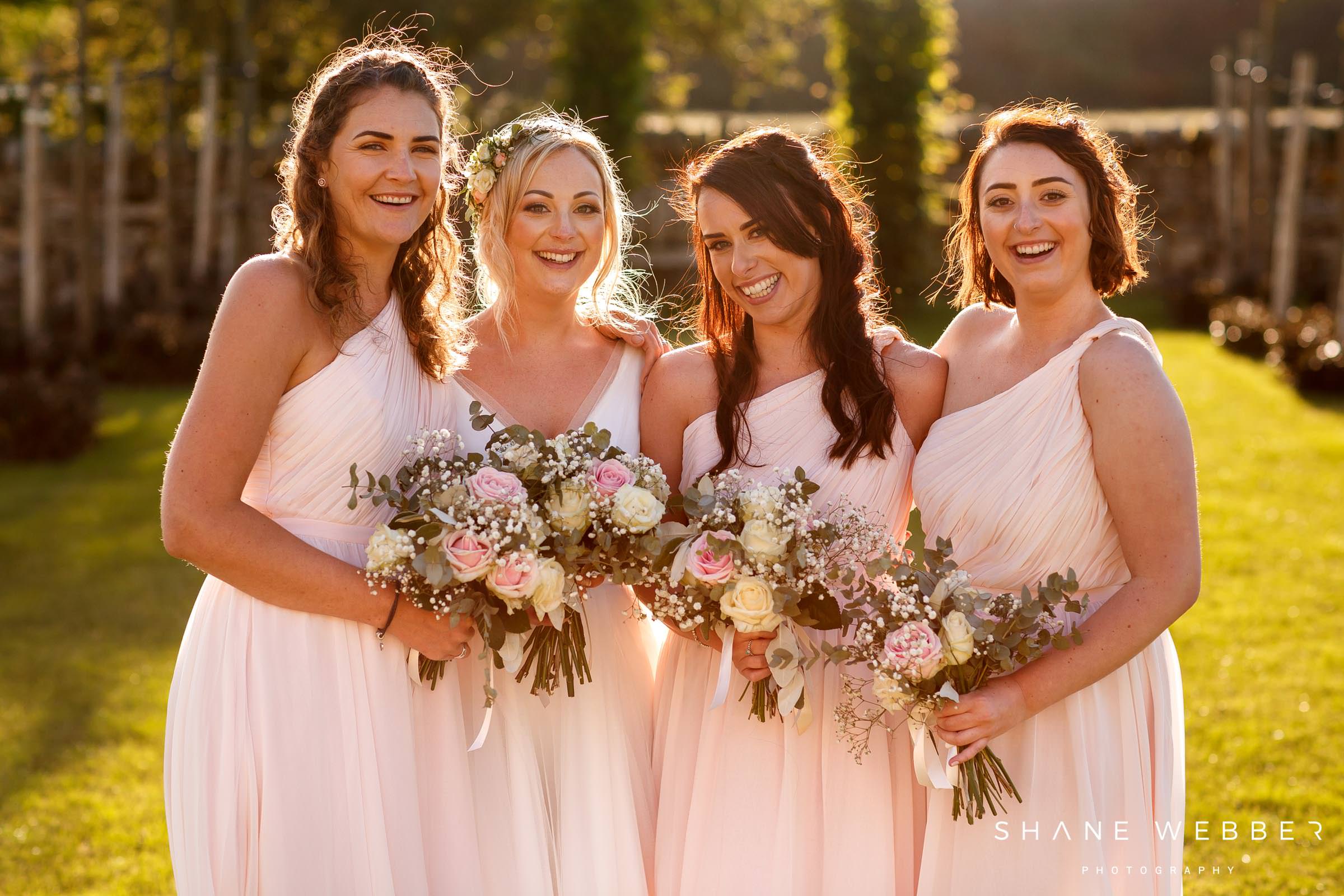 photo of bridesmaids wearing pink dresses